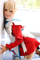 Rule 34 | 1girl, against wall, asian, blonde hair, brown footwear, cosplay, erstin ho, erstin ho (cosplay), garter straps, indoors, kipi-san, kneeling, loafers, looking at viewer, my-otome, on floor, photo (medium), school uniform, shoes, short hair, solo, thighhighs, white thighhighs, zettai ryouiki