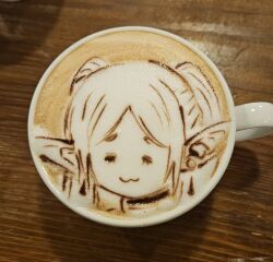 Rule 34 | 1girl, :3, = =, closed eyes, closed mouth, coffee, commentary request, cup, drink, earrings, elf, food art (medium), frieren, george (yamamoto kazuki), highres, jewelry, latte art, latte art (medium), long hair, long pointy ears, parted bangs, photo (medium), pointy ears, portrait, sad, solo, sousou no frieren, twintails, unconventional media