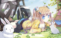 Rule 34 | 1girl, basket, black thighhighs, blonde hair, blue eyes, blush, breasts, cleavage, clover, clover (flower), collarbone, flower, four-leaf clover, hair flower, hair ornament, hairclip, hand on own cheek, hand on own face, jacket, jin young-in, long hair, lying, medium breasts, motor vehicle, motorcycle, mouth hold, on stomach, original, rabbit, shorts, solo, thighhighs, twintails, vehicle