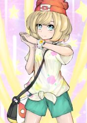 Rule 34 | 1girl, alternate hair color, bag, beanie, belt bag, blonde hair, blue eyes, blush, bracelet, breasts, closed mouth, cowboy shot, creatures (company), fenistia, floral print, game freak, green shorts, hands up, hat, highres, jewelry, looking at viewer, medium bangs, nintendo, own hands together, pink background, pokemon, pokemon sm, red hat, selene (pokemon), shirt, short hair, shorts, small breasts, solo, standing, star (symbol), tied shirt, wide sleeves, yellow shirt, z-ring