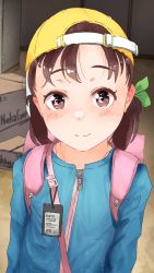 Rule 34 | 1girl, backpack, backwards hat, bag, barcode, blue jacket, blush, box, brown eyes, brown hair, cardboard box, child, clip studio paint (medium), closed mouth, commentary request, cyrillic, green ribbon, hair ribbon, hat, highres, id card, jacket, long sleeves, looking at viewer, medium hair, original, pink bag, randoseru, ribbon, russian commentary, russian text, servachok, short twintails, smile, solo, split mouth, translated, twintails, upper body, yellow hat, zipper