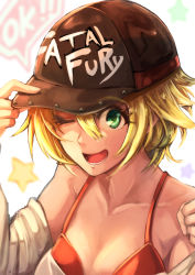 Rule 34 | 1girl, alice garnet nakata, bad id, bad pixiv id, bare shoulders, baseball cap, blonde hair, breasts, cleavage, collarbone, commentary request, green eyes, hat, looking at viewer, medium breasts, nanahoshi kou, open mouth, short hair, simple background, smile, solo, star (symbol), the king of fighters, the king of fighters xiv