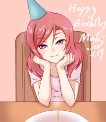 Rule 34 | 10s, 1girl, candle, chair, character name, dated, half-closed eyes, happy birthday, hat, head rest, looking at viewer, love live!, love live! school idol project, nishikino maki, nuenya, party hat, pink background, pink shirt, purple eyes, red hair, shirt, short hair, short sleeves, simple background, sitting, smile, solo, t-shirt