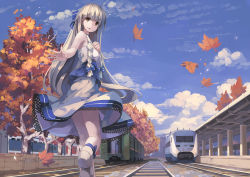 Rule 34 | 1girl, autumn leaves, blonde hair, blue eyes, dress, huanxiang huifeng, long hair, looking at viewer, original, outdoors, railroad tracks, smile, solo, train, train station