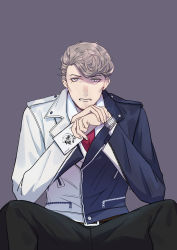Rule 34 | 1boy, absurdres, amaguni hitoya, black pants, card, facial hair, fishfall, goatee stubble, grey background, highres, holding, holding card, hypnosis mic, jacket, joker (playing card), light brown hair, looking at viewer, male focus, mole, mole under eye, multicolored clothes, multicolored jacket, own hands together, pants, playing card, sitting, solo, stubble, two-tone jacket, watch, wristwatch, yellow eyes, zipper