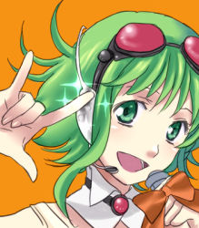 Rule 34 | 1girl, \m/, bad id, bad pixiv id, collar, goggles, goggles on head, green eyes, green hair, gumi, hani (udauda), headphones, lowres, matching hair/eyes, microphone, nakajima megumi, open mouth, red-tinted eyewear, seikan hikou, short hair, simple background, smile, solo, tinted eyewear, vocaloid, voice actor connection