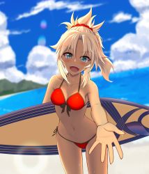 Rule 34 | 1girl, blonde hair, blush, breasts, cleavage, dark-skinned female, dark skin, fate/grand order, fate (series), green eyes, highres, holding, holding behind back, holding surfboard, kuroshiro (ms-2420), looking at viewer, medium breasts, mordred (fate), mordred (fate) (all), mordred (swimsuit rider) (fate), mordred (swimsuit rider) (first ascension) (fate), navel, open mouth, red scrunchie, scrunchie, short hair, short ponytail, smile, solo, standing, surfboard, tan, teeth