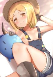 Rule 34 | 1girl, blonde hair, blush, boots, fate/grand order, fate (series), flat chest, gloves, hat, highres, looking at viewer, maosame, naked overalls, overalls, paul bunyan (fate), paul bunyan (third ascension) (fate), short hair, smile, solo, yellow eyes