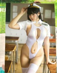 Rule 34 | 1girl, breasts, classroom, cleavage cutout, clothing cutout, gravure idol, indoors, large breasts, looking at viewer, photo (medium), police, real life, revealing clothes, shinonome umi, sideboob, standing, swimsuit