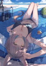 Rule 34 | 1girl, alcohol, amane utata, animal ears, beach, bikini, closed mouth, food, fruit, highres, looking at viewer, lying, ocean, partially submerged, rubber duck, swimsuit, water, watermelon, wine, yellow eyes