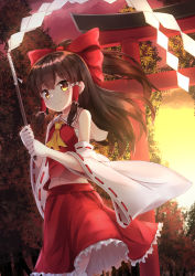Rule 34 | 1girl, ascot, bow, brown eyes, brown hair, detached sleeves, frilled skirt, frills, from below, gohei, hair bow, hair tubes, hakurei reimu, highres, holding, japanese clothes, long hair, looking at viewer, looking down, matching hair/eyes, midriff, miko, mk82 (hoonsyh), navel, outdoors, ponytail, red bow, red skirt, ribbon-trimmed sleeves, ribbon trim, sarashi, skirt, smile, solo, sunlight, torii, touhou, tree, wide sleeves, yellow ascot