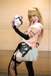 Rule 34 | 1girl, amane misa, amane misa (cosplay), asian, bare shoulders, blonde hair, breasts, choker, cosplay, cross, death note, elbow gloves, fingerless gloves, fishnet thighhighs, fishnets, garter straps, gloves, hair ornament, highres, indoors, jewelry, kipi-san, lace, long hair, looking at viewer, looking back, miniskirt, mole, photo (medium), ring, single glove, skirt, skull and crossbones, skull hair ornament, skull ring, small breasts, solo, thighhighs, two side up, zettai ryouiki