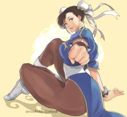 Rule 34 | 1girl, blue dress, boots, bracelet, breasts, brown eyes, brown hair, capcom, china dress, chinese clothes, chun-li, clenched hand, cross-laced footwear, double bun, dress, earrings, full body, hair bun, hair ribbon, highres, jewelry, knee boots, lace-up boots, lips, looking at viewer, medium breasts, nishinb, outstretched arm, pantyhose, pearl earrings, pelvic curtain, puffy short sleeves, puffy sleeves, ribbon, short sleeves, sitting, solo, spiked bracelet, spikes, street fighter, street fighter v, swept bangs, thighs, twitter username, white footwear, white ribbon