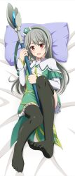 Rule 34 | 1girl, absurdres, bed sheet, black thighhighs, blush, capelet, dakimakura (medium), dress, flat chest, frilled dress, frills, full body, futoku no guild, green dress, green hair, hair between eyes, hat, highres, holding, holding staff, ishida seito, knee up, looking at viewer, lying, mage staff, maidena angers, mini hat, on back, on bed, open mouth, pillow, red eyes, solo, staff, thighhighs, toes, white capelet, white sleeves