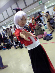 Rule 34 | 1girl, asian, cosplay, cosplay photo, dress, dutch angle, female focus, looking at viewer, outstretched arm, photo (medium), real life, sash, short sleeves, silver hair, touhou, yagokoro eirin