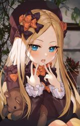 Rule 34 | 1girl, abigail williams (fate), black bow, black dress, black hat, blonde hair, blue eyes, blush, bow, breasts, double v, dress, fate/grand order, fate (series), forehead, hair bow, hamube, hands up, hat, highres, holding, holding stuffed toy, knees up, long hair, long sleeves, looking at viewer, multiple hair bows, open mouth, orange bow, parted bangs, plant, sitting, solo, stuffed animal, stuffed toy, teddy bear, tongue, tongue out, v