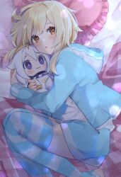 Rule 34 | 1girl, alternate costume, bed, blanket, blonde hair, blue hoodie, blue shorts, blue thighhighs, blush, bodysuit, brown eyes, character doll, closed mouth, commentary request, doll, eyes visible through hair, fingernails, frills, genshin impact, grey bodysuit, grey hair, grey thighhighs, hair between eyes, halo, hands up, heart, heart-shaped pillow, highres, hood, hoodie, hug, indoors, light, lips, long sleeves, looking to the side, lumine (genshin impact), lying, mayu-mayu1026, no headwear, no shoes, on side, open clothes, open hoodie, open mouth, paimon (genshin impact), pillow, pocket, puffy long sleeves, puffy sleeves, purple eyes, shadow, short hair, short hair with long locks, shorts, sidelocks, solo, striped clothes, striped thighhighs, thighhighs, tongue, zipper