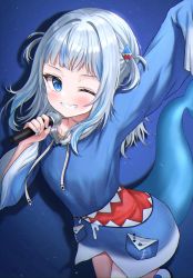 Rule 34 | 1girl, ;), arm up, blue background, blue eyes, blue hair, blue hoodie, blue theme, blush, commentary, drawstring, fins, fish tail, gawr gura, gawr gura (1st costume), grin, hair ornament, hand up, highres, holding, holding microphone, hololive, hololive english, hood, hoodie, leaning forward, long hair, long sleeves, looking at viewer, microphone, multicolored hair, one eye closed, shark hair ornament, shark tail, sharp teeth, sidelocks, silver hair, simple background, sleeves past fingers, sleeves past wrists, smile, solo, standing, streaked hair, tail, teeth, ttusee5, two side up, virtual youtuber