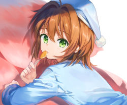 Rule 34 | 1girl, ahoge, blue hat, blue shirt, blush, brown hair, candy, cardcaptor sakura, closed mouth, commentary request, food, green eyes, hair between eyes, hair intakes, hat, holding, holding candy, holding food, holding lollipop, kinomoto sakura, lollipop, long sleeves, looking at viewer, looking to the side, lying, nightcap, on stomach, pajamas, shirt, solo, upper body, white background, zhi (yammycheese)