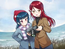 Rule 34 | 2girls, :d, beanie, black shirt, blue coat, blue hair, blunt bangs, blush, brand name imitation, brown coat, camera, ceph (greatyazawa1819), coat, commentary request, day, grass, hair ornament, hairclip, hand on own hip, hat, highres, holding, holding camera, long hair, long sleeves, love live!, love live! sunshine!!, multiple girls, nikon (company), ocean, open mouth, outdoors, red eyes, red hair, red hat, sakurauchi riko, scarf, shirt, smile, striped clothes, striped scarf, tsushima yoshiko, winter clothes, yellow eyes