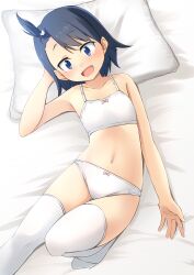 Rule 34 | arm behind head, bed sheet, blue eyes, blue hair, bow, bow panties, bra, collarbone, commentary, commission, fang, flat chest, from above, highres, hodaka natsumi, houkago teibou nisshi, looking at viewer, lying, navel, on back, open mouth, panties, pillow, pixiv commission, shibacha, short hair, smile, solo, thighhighs, training bra, underwear, white panties, white thighhighs