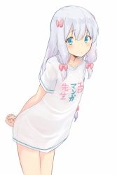Rule 34 | 10s, 1girl, arms behind back, blue eyes, blush, closed mouth, clothes writing, collarbone, commentary request, eromanga sensei, hair between eyes, hair ribbon, izumi sagiri, leaning forward, legs, long hair, looking at viewer, raised eyebrows, ribbon, shirt, sidelocks, silver hair, simple background, solo, standing, uro (urotanc), white background, white shirt