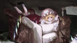 Rule 34 | 1girl, absurdres, black footwear, blonde hair, crystal, flandre scarlet, full body, happiness lilys, hat, hat ribbon, highres, holding, indoors, laevatein (touhou), looking at viewer, lying, medium hair, mob cap, on chair, on stomach, one side up, open mouth, puffy short sleeves, puffy sleeves, red eyes, red ribbon, ribbon, short sleeves, solo, table, touhou, white hat, white legwear, wings, wrist cuffs