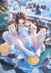 Rule 34 | 1girl, armpits, atdan, azur lane, bare shoulders, black hair, blue dress, breasts, clothing cutout, collarbone, commentary, cup, dress, feet, feet on toy, flower, fur trim, hair flower, hair ornament, hairpin, headdress, highres, horns, long hair, looking at viewer, manjuu (azur lane), medium breasts, no shoes, noshiro (azur lane), noshiro (fragrance of the eastern snow) (azur lane), official alternate costume, oni horns, outdoors, parted lips, pelvic curtain, purple eyes, reclining, revision, side cutout, sitting, sleeveless, sleeveless dress, solo, spread legs, steam, thighhighs, thighs, very long hair, white thighhighs