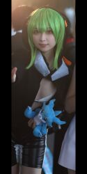 Rule 34 | 1girl, cosplay, digimon, female focus, green hair, highres, looking at viewer, photo (medium), real life, shinomiya rina, shinomiya rina (cosplay), smile, solo, v-mon