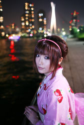 Rule 34 | 1girl, cityscape, hairband, highres, japanese clothes, kimono, night, photo (medium), shio, solo, strawberry pattern, water, waterfront