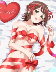 Rule 34 | 1girl, absurdres, amami haruka, bed sheet, breasts, brown hair, cleavage, collarbone, commentary request, green eyes, hair ribbon, haruki (haruki678), heart, heart-shaped pillow, highres, idolmaster, idolmaster (classic), large breasts, looking at viewer, lying, naked ribbon, navel, on back, open mouth, pillow, red ribbon, ribbon, short hair, smile, solo, stomach