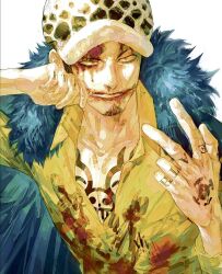 Rule 34 | 1boy, black hair, blood, blood on clothes, blood on face, chest tattoo, coat, coat on shoulders, facial hair, finger tattoo, fur coat, fur hat, goatee, hand tattoo, hat, highres, jaguar print, kataruruni, long sideburns, looking at viewer, male focus, one piece, shirt, short hair, sideburns, simple background, solo, tattoo, trafalgar law, white background, yellow shirt
