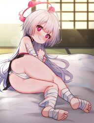 Rule 34 | 1girl, architecture, ass, ass focus, bad source, bandaged arm, bandaged foot, bandaged leg, bandages, blue archive, blush, east asian architecture, feet, futon, grey hair, grin, halo, highres, indoors, long hair, looking at viewer, looking back, luxuriou s, lying, naughty face, on side, partially visible vulva, pink eyes, red halo, seductive smile, shuro (blue archive), sideless dress, smile, soles, solo, thighs, toeless legwear, toes, very long hair