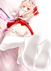 Rule 34 | 1girl, ass, bad id, bad pixiv id, blonde hair, bridal garter, feet, female focus, flandre scarlet, foot focus, foreshortening, hat, hat ribbon, looking at viewer, lying, no shoes, on stomach, oouso, panties, pantyshot, red eyes, ribbon, side ponytail, skirt, soles, solo, sweat, thigh strap, thighhighs, toes, touhou, underwear, upskirt, white panties, white thighhighs, wings