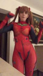 Rule 34 | 1girl, animated, ass shake, blue eyes, bodysuit, brazilian (nationality), breasts, brown hair, cosplay, dancing, eating, hairpods, highres, interface headset, lips, looking at viewer, medium breasts, memepantazis, neon genesis evangelion, photo (medium), plugsuit, red bodysuit, shiny clothes, solo, sound, souryuu asuka langley, souryuu asuka langley (cosplay), standing, twintails, two side up, video, wide hips