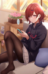Rule 34 | 1girl, black pantyhose, blurry, cellphone, couch, depth of field, hair ornament, hairpin, highres, higuchi madoka, holding, holding phone, idolmaster, idolmaster shiny colors, ironatsuki, leg up, long sleeves, looking at viewer, looking to the side, mole, mole under eye, no shoes, office, pantyhose, phone, plaid, plaid skirt, red hair, short hair, signature, sitting, skirt, solo, sunset, translated, window