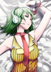 Rule 34 | 1girl, from above, goggles, green eyes, green hair, gumi, headset, looking at viewer, looking up, lying, matching hair/eyes, necktie, on back, short hair, sinzan, solo, striped, upper body, vocaloid, wrist cuffs
