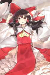 Rule 34 | 1girl, arm up, ascot, bad id, bad twitter id, bed sheet, black eyes, black hair, blush, bow, cheunes, detached sleeves, hair between eyes, hair bow, hair tubes, hakurei reimu, highres, long hair, looking at viewer, lying, on back, open mouth, red bow, sidelocks, solo, string, string of fate, touhou