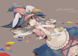 Rule 34 | 1girl, animal ears, bad id, bad pixiv id, bow, character name, copyright name, dress, hands on own chest, hat, irisu kyouko, irisu shoukougun!, looking at viewer, lying, own hands together, rabbit ears, red eyes, sabunaga (partisan), silver hair, solo, witch hat