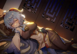 1girl ahoge bare_shoulders bed bell blue_hair blush breasts brown_pantyhose bugie chinese_knot detached_sleeves flower_knot ganyu_(genshin_impact) genshin_impact gold_trim highres horns indoors jewelry large_breasts long_hair looking_at_viewer lying neck_bell on_side one_eye_closed pantyhose purple_eyes sidelocks solo tassel thighlet thighs variant_set vision_(genshin_impact) white_sleeves