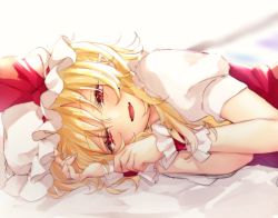 Rule 34 | bed sheet, blonde hair, bow, fangs, flandre scarlet, frills, hand in own hair, hat, hi o kawa, lying, mob cap, on side, open mouth, pointy ears, red bow, red eyes, red vest, short hair, smile, touhou, vest, white sleeves, wrist cuffs