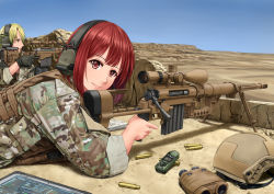 Rule 34 | 1boy, 1girl, absurdres, anti-materiel rifle, binoculars, blonde hair, bolt action, camouflage, cheytac m200, commentary, day, desert, gloves, gun, headset, unworn headwear, helmet, unworn helmet, highres, jpc, knee pads, kneeling, load bearing vest, looking at viewer, looking to the side, lying, military, military program, military uniform, on stomach, original, panasonic corporation, precision sniper rifle (military program), prototype design, red eyes, red hair, remington msr, rifle, scope, shadow, shell casing, short hair, sky, sleeves rolled up, smile, sniper, sniper rifle, soldier, tablet pc, trigger discipline, uniform, weapon