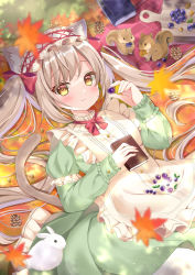 Rule 34 | 1girl, absurdres, acorn, animal ears, autumn leaves, blanket, book, cat ears, cat tail, dress, food, fruit, grapes, green dress, hairband, hamico, headdress, highres, holding, leaf, light smile, long hair, looking at viewer, lying, maple leaf, on back, original, pinecone, platinum blonde hair, puffy sleeves, rabbit, sidelocks, squirrel, tail, twintails, very long hair, yellow eyes