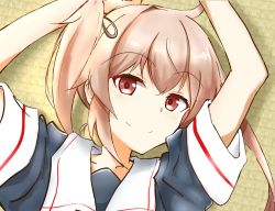 Rule 34 | 1girl, arms up, black serafuku, commentary request, derivative work, harusame (kancolle), highres, iminami sui, kantai collection, looking at viewer, lying, parody, pink hair, red eyes, sailor collar, school uniform, serafuku, side ponytail, smile, solo, tatami, upper body, white sailor collar