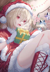 Rule 34 | 1girl, :d, blonde hair, blush, boots, bow, capelet, christmas ornaments, commentary, crystal, dress, flandre scarlet, fur-trimmed capelet, fur-trimmed dress, fur-trimmed footwear, fur-trimmed headwear, fur trim, gift, hair between eyes, hat, heart, highres, holding, holding gift, looking at viewer, lower teeth only, open mouth, red capelet, red dress, red eyes, red footwear, red hat, santa hat, shorts, side ponytail, smile, solo, teeth, toku kekakewanko, tongue, touhou, tree, white shorts, wings, yellow bow