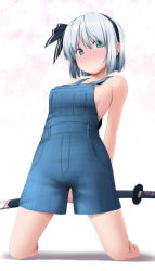 Rule 34 | 1girl, arms behind back, bare arms, bare legs, bare shoulders, barefoot, black hairband, blush, breasts, closed mouth, commentary, commission, eyes visible through hair, green eyes, hairband, highres, holding, holding sheath, kneeling, konpaku youmu, looking at viewer, medium breasts, naked overalls, nori tamago, nose blush, overall shorts, overalls, sheath, sheathed, short hair, silver hair, simple background, skeb commission, solo, sword, touhou, weapon