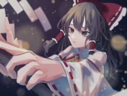 Rule 34 | 1girl, ascot, blurry, bokeh, bow, brown hair, dark background, depth of field, detached sleeves, foreshortening, frills, gohei, hair bow, hair tubes, hakurei reimu, highres, holding, holding stick, japanese clothes, light particles, long hair, looking ahead, miko, one-hour drawing challenge, outstretched arm, parted lips, perspective, red bow, red eyes, ribbon-trimmed sleeves, ribbon trim, roserose626, solo, stick, touhou, upper body, wide sleeves