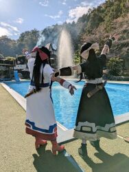 2girls ainu_clothes asian ass black_hair cosplay fingerless_gloves gloves hair_ribbon high_heels japanese_(nationality) long_hair multiple_girls nakoruru pool ribbon samurai_spirits snk water weapon