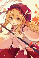 Rule 34 | 1girl, autumn leaves, blonde hair, chuqi1030, commentary request, gohei, hat, holding, holding gohei, hourai girl (touhou), japanese clothes, juliet sleeves, kimono, long hair, long sleeves, mob cap, portrait of exotic girls, puffy sleeves, red hat, red skirt, skirt, smile, solo, touhou, upper body, very long hair, white kimono, wide sleeves, yellow eyes