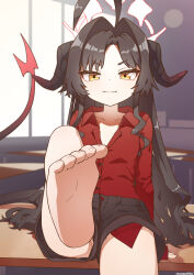 Rule 34 | 1girl, :3, ahoge, barefoot, black hair, black shorts, blue archive, closed mouth, demon girl, demon horns, desk, feet, foot focus, foot out of frame, halo, highres, horns, indoors, kasumi (blue archive), leg up, long hair, looking at viewer, mountain han, on desk, presenting foot, red shirt, school desk, shirt, shorts, sitting, smile, soles, solo, toe scrunch, toenails, toes, yellow eyes